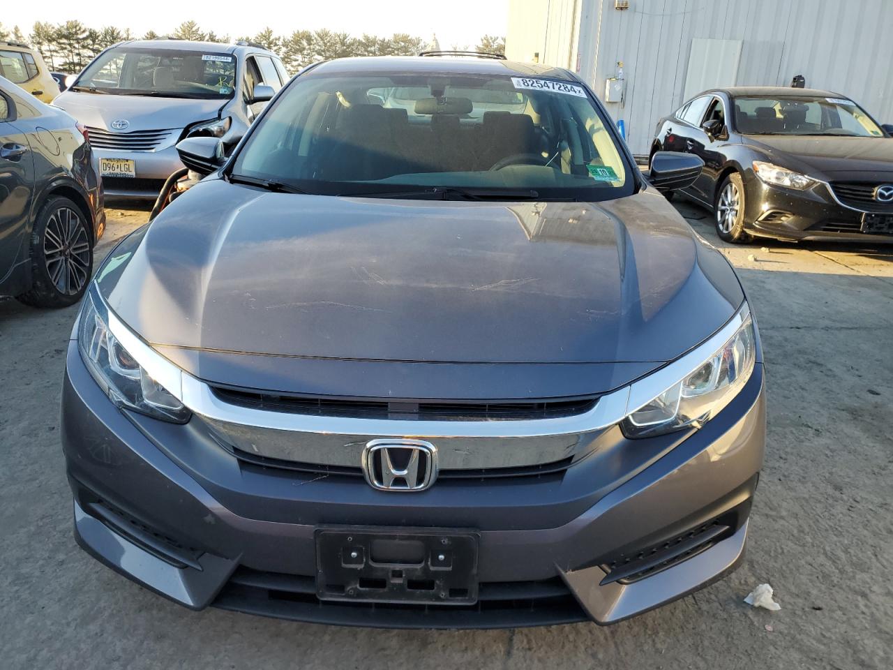2018 Honda Civic VIN 2HGFC2F55JH609339 Copart auction photo, side / rear end damage thumbnail 5