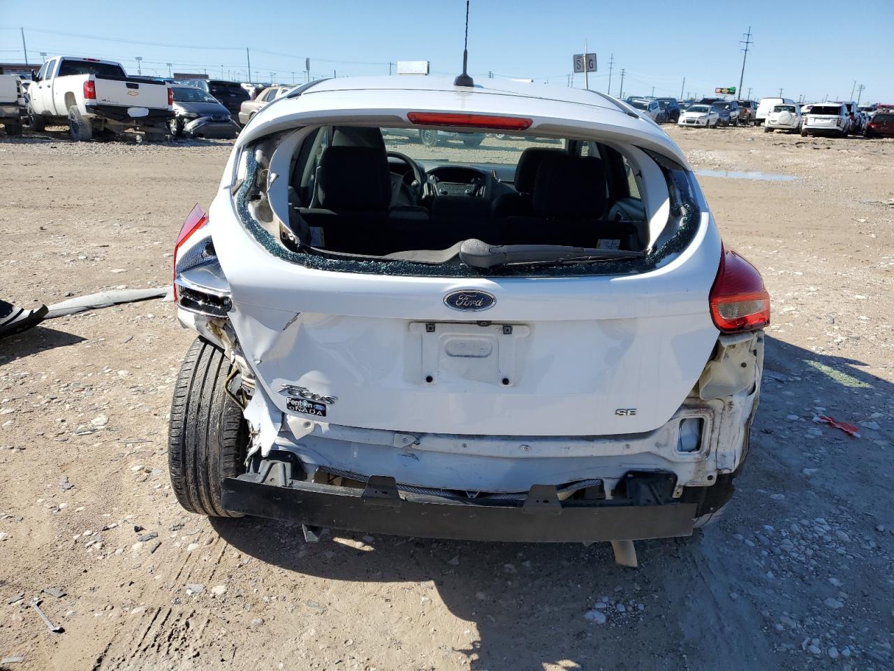 2016 Ford Focus VIN 1FADP3K24GL284132 Copart auction photo, rear end / front end damage thumbnail 6