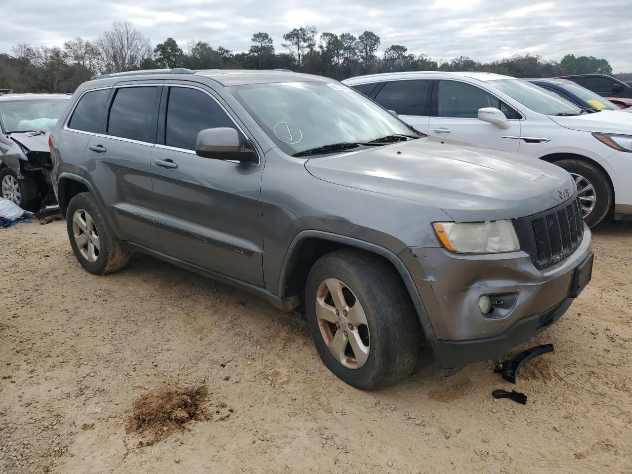 2012 Jeep Grand Cherokee VIN 1C4RJEAG7CC146069 Copart auction photo, side damage thumbnail 4