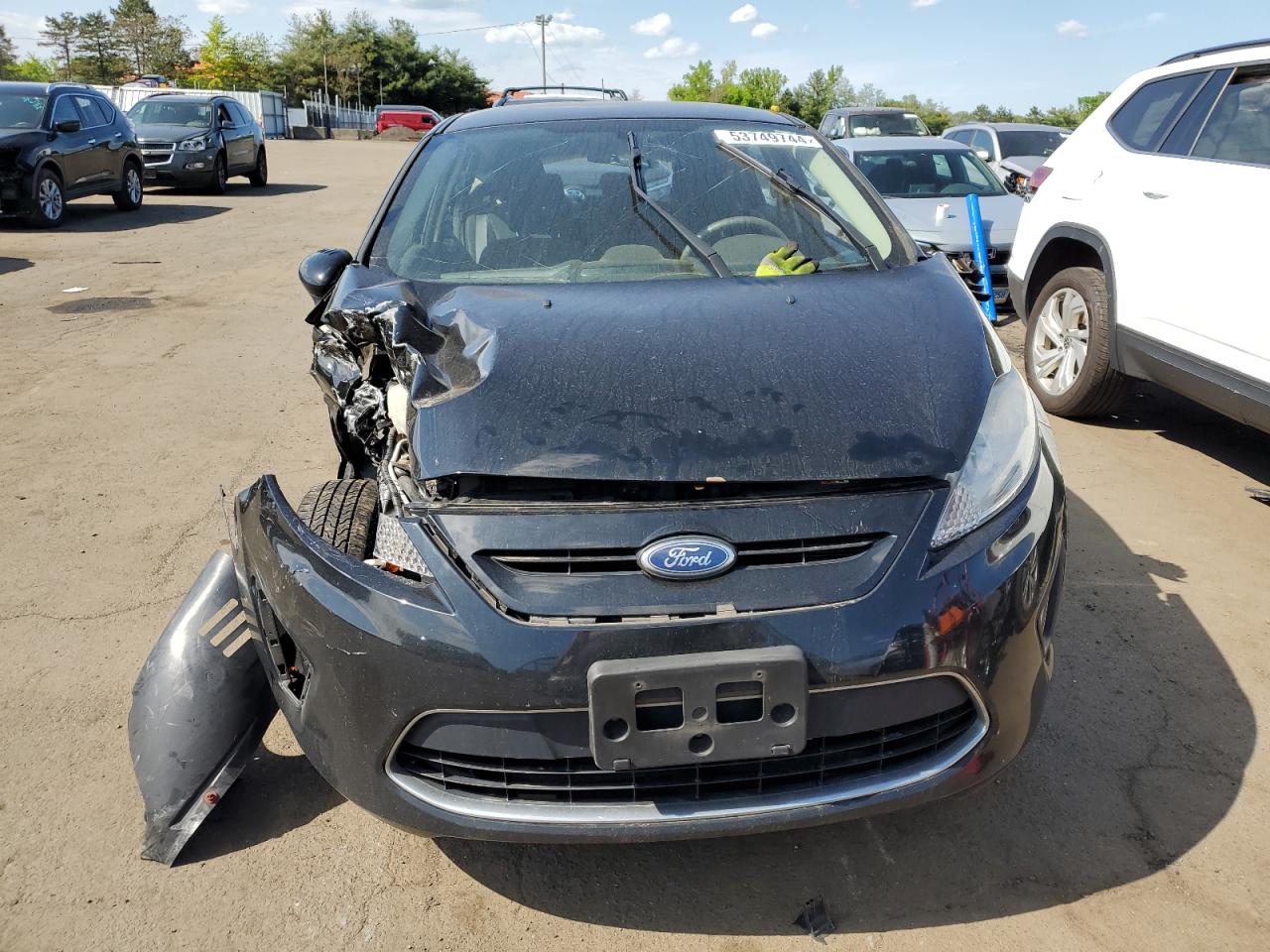 2012 Ford Fiesta VIN 3FADP4EJXCM136925 Copart auction photo, all over damage thumbnail 5
