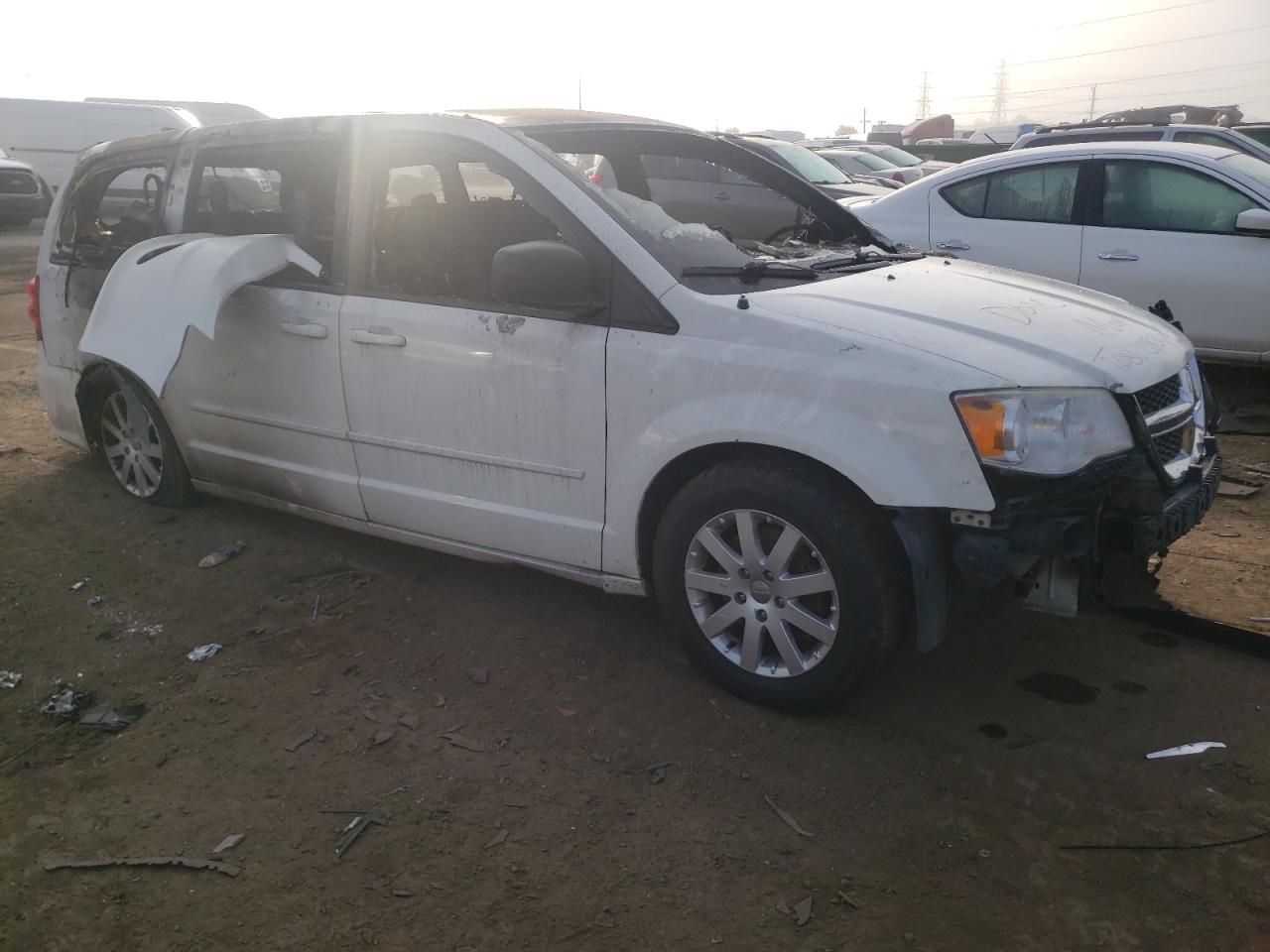 2013 Dodge Caravan VIN 2C4RDGCG5DR687761 Copart auction photo, burn - interior / burn damage thumbnail 4