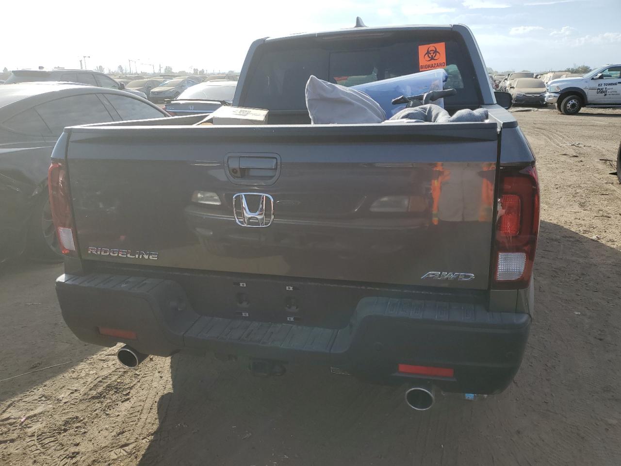 2022 Honda Ridgeline VIN 5FPYK3F74NB029701 Copart auction photo, all over damage thumbnail 6