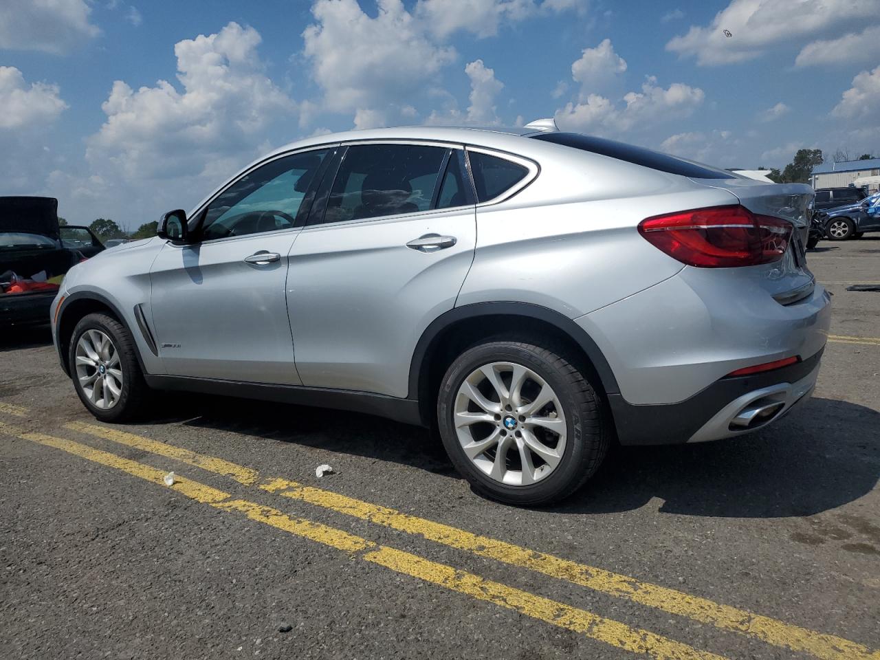 2019 BMW X6 VIN 5UXKU0C57K0S97385 Copart auction photo, side / front end damage thumbnail 2