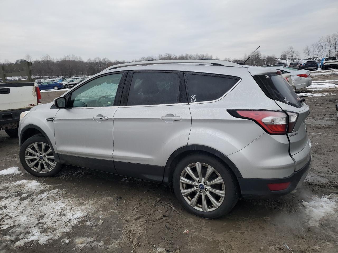 2017 Ford Escape VIN 1FMCU9JD0HUF00926 Copart auction photo, side / rear end damage thumbnail 2