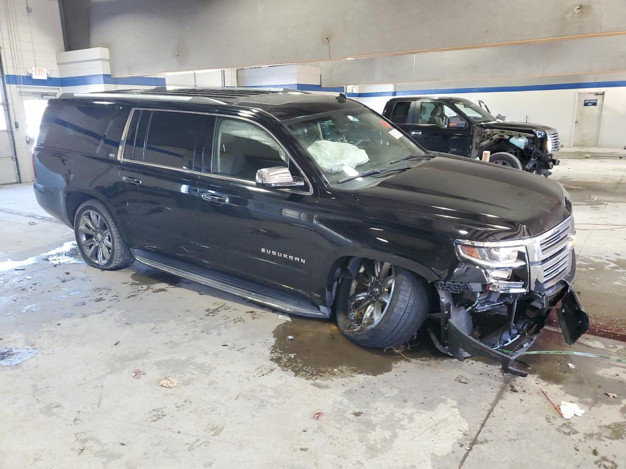 2015 Chevrolet Suburban VIN 1GNSCKKC5FR290248 Copart auction photo, front end / undercarriage damage thumbnail 4