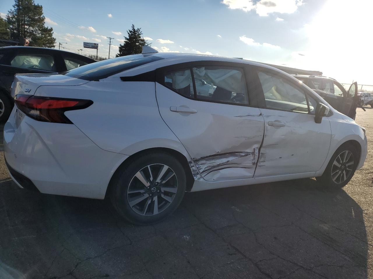 2021 Nissan Versa VIN 3N1CN8EV6ML807314 Copart auction photo, side / rear end damage thumbnail 3