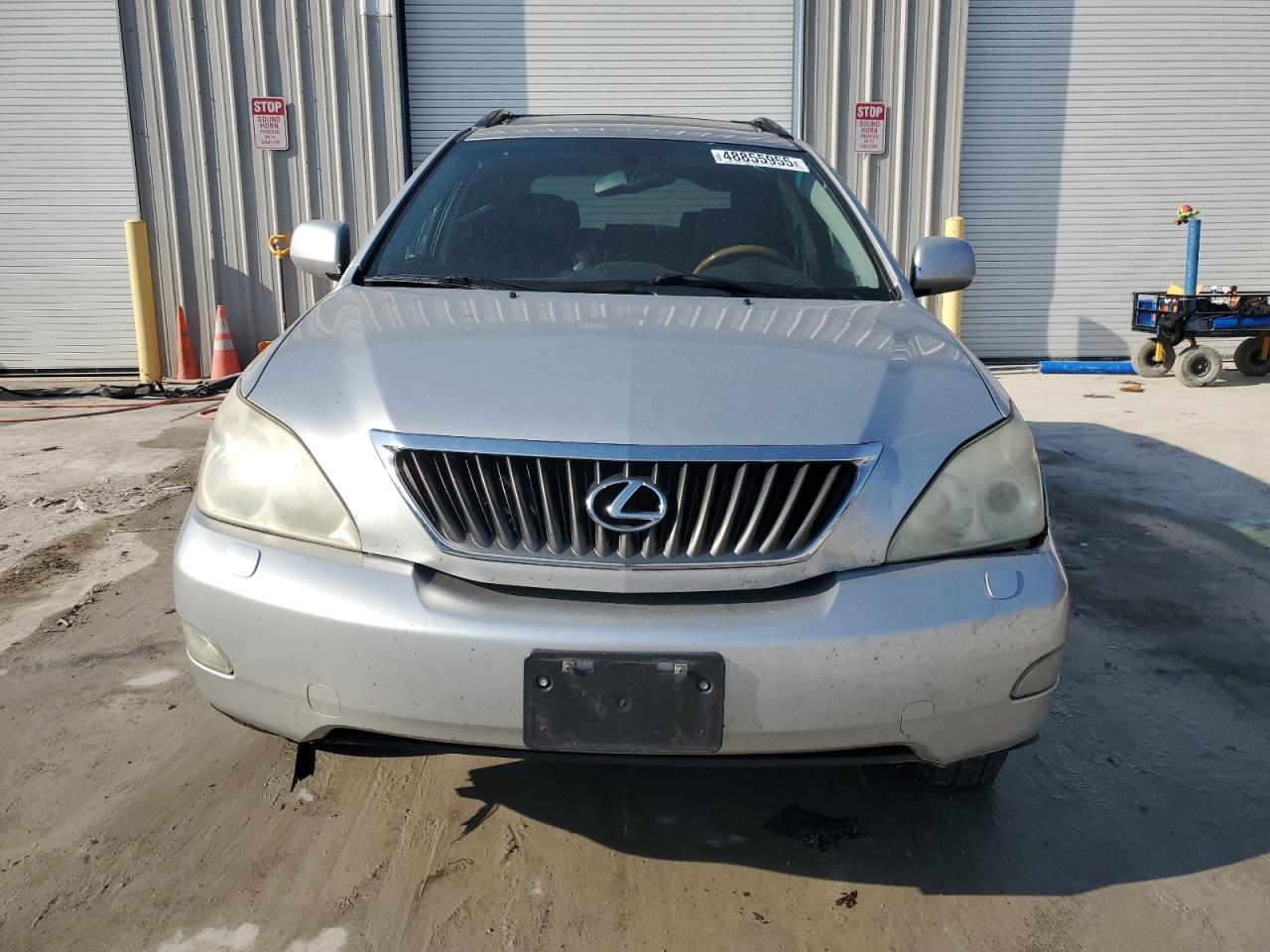 2009 Lexus RX VIN 2T2HK31U99C102119 Copart auction photo, undercarriage / front end damage thumbnail 5