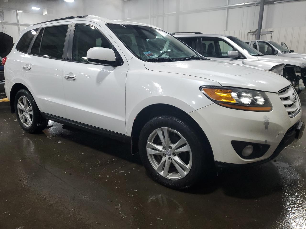 2011 Hyundai Santa Fe VIN 5XYZK4AG9BG048310 Copart auction photo, rear end damage thumbnail 4