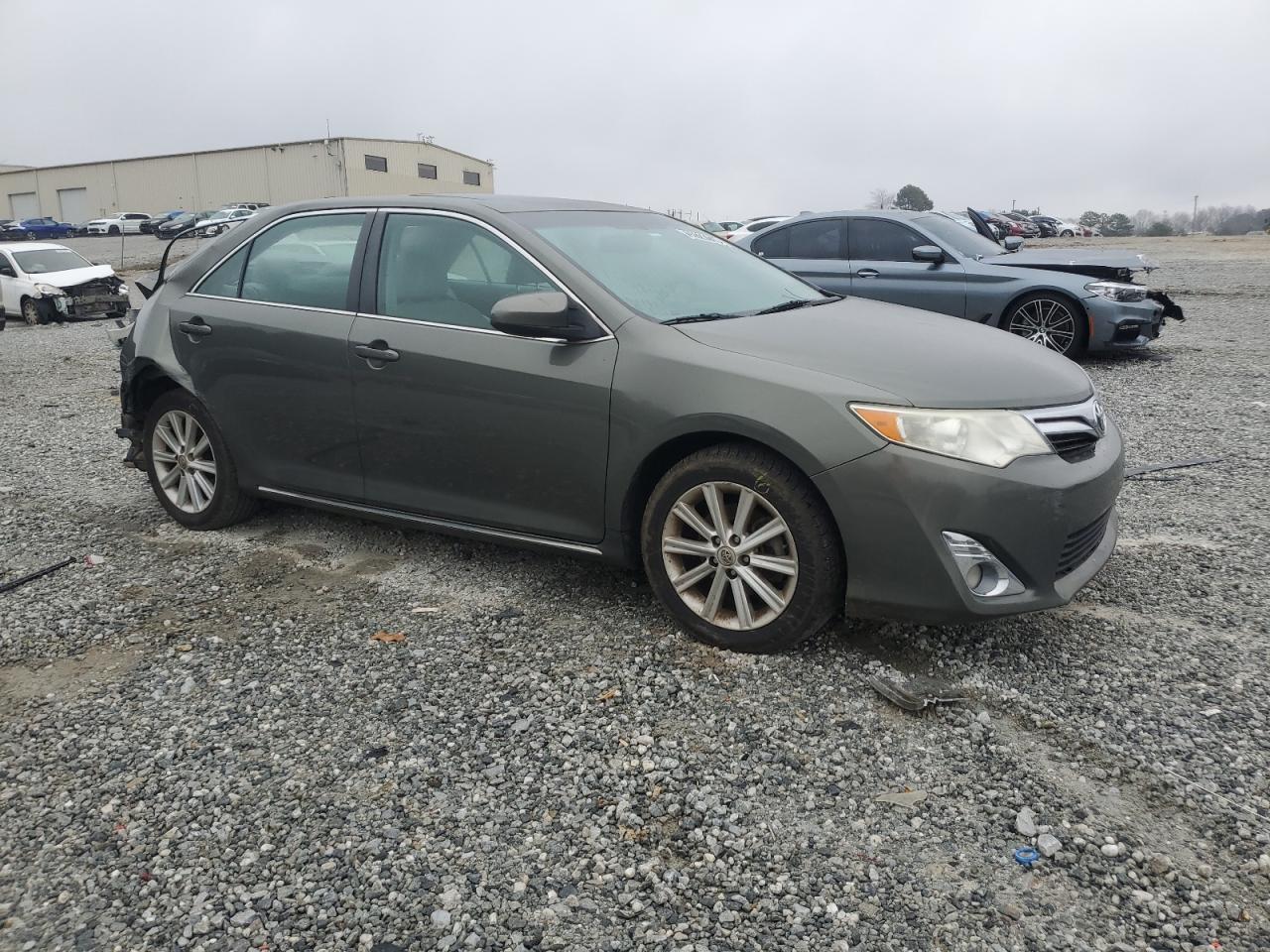 2014 Toyota Camry VIN 4P1BF1FK1EU815499 Copart auction photo, rear end / minor dent/scratches damage thumbnail 4