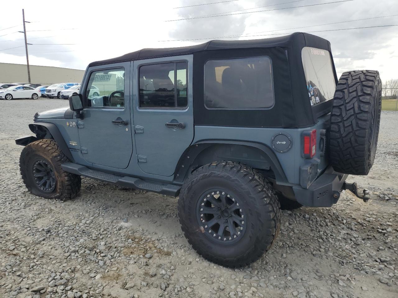 2015 Jeep Wrangler VIN 1C4HJWEG1FL693094 Copart auction photo, front end / undercarriage damage thumbnail 2