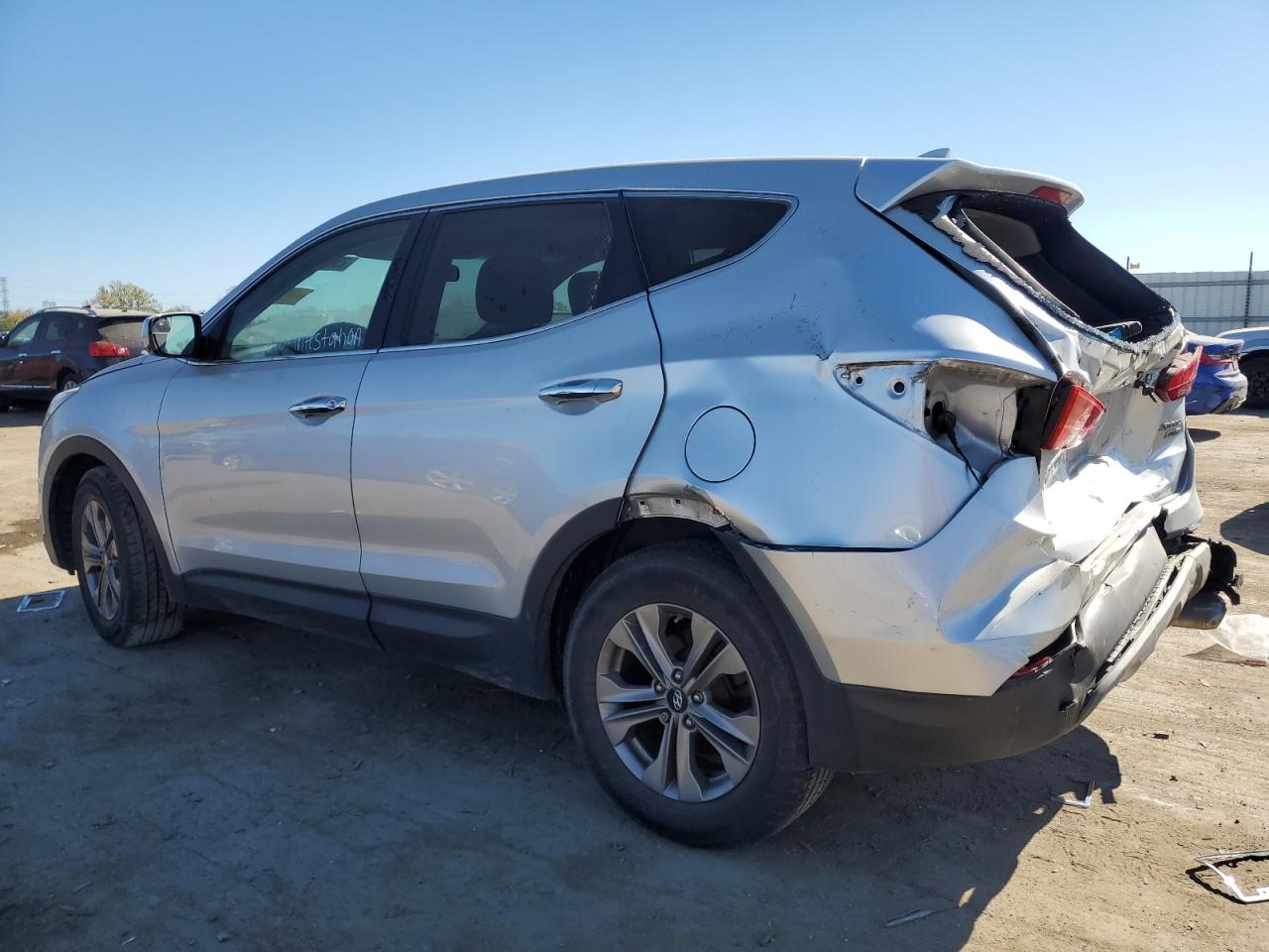 2015 Hyundai Santa Fe VIN 5XYZTDLB8FG300570 Copart auction photo, rear end damage thumbnail 2