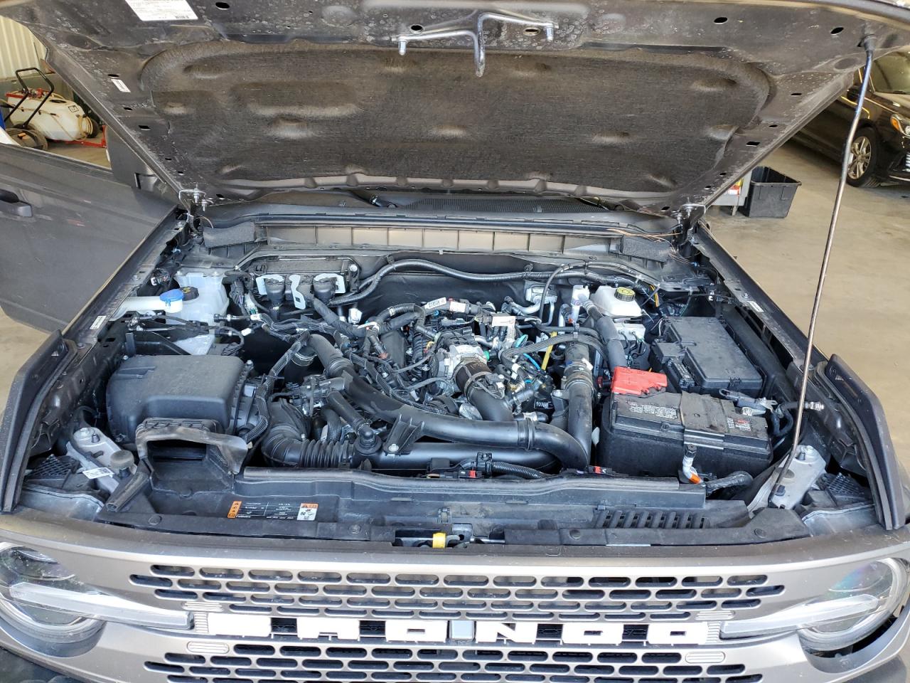 2023 Ford Bronco VIN 1FMEE5DP7PLB64989 Copart auction photo, side / front end damage thumbnail 12