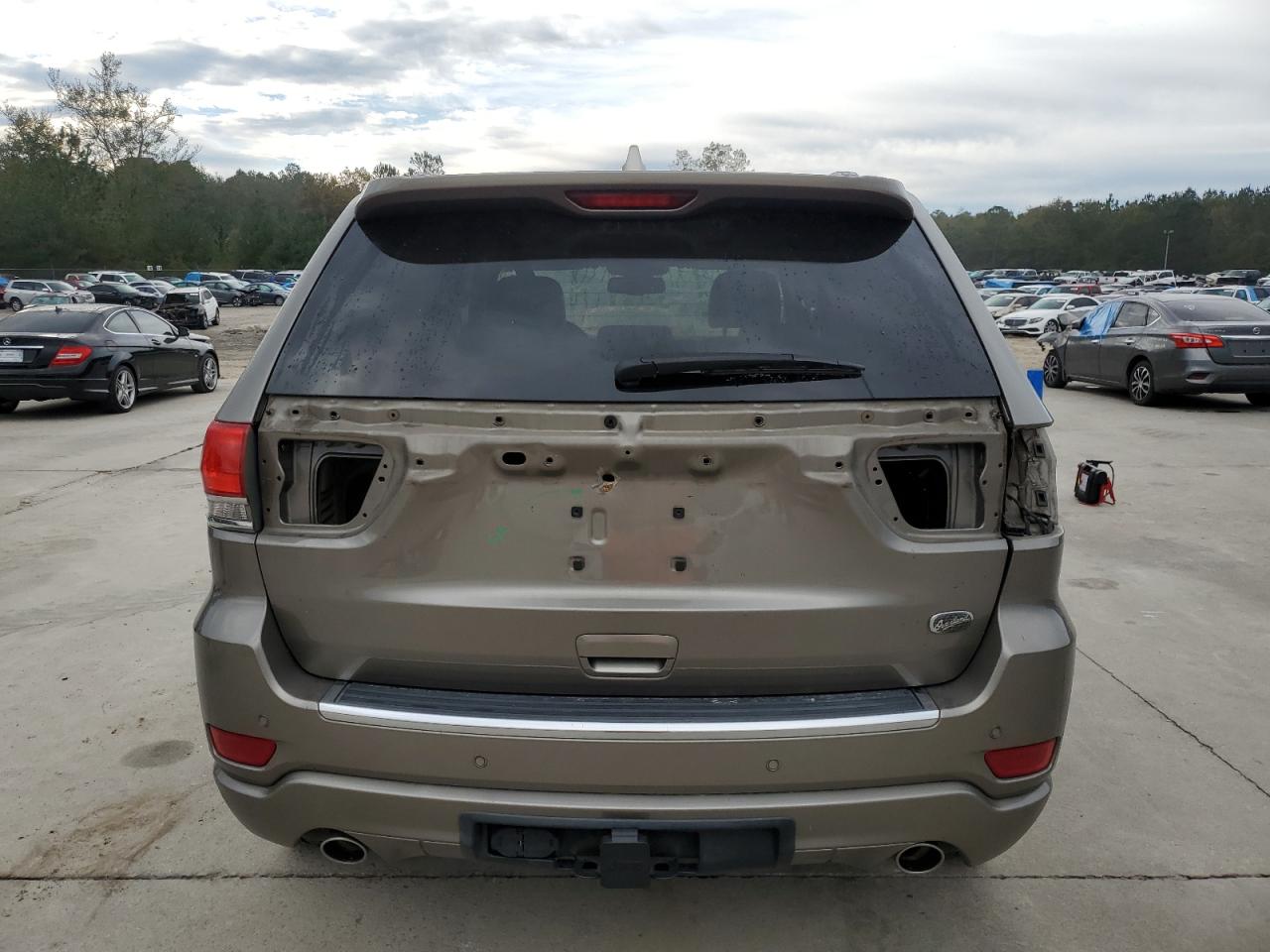2016 Jeep Grand Cherokee VIN 1C4RJECG1GC466023 Copart auction photo, vandalism damage thumbnail 6