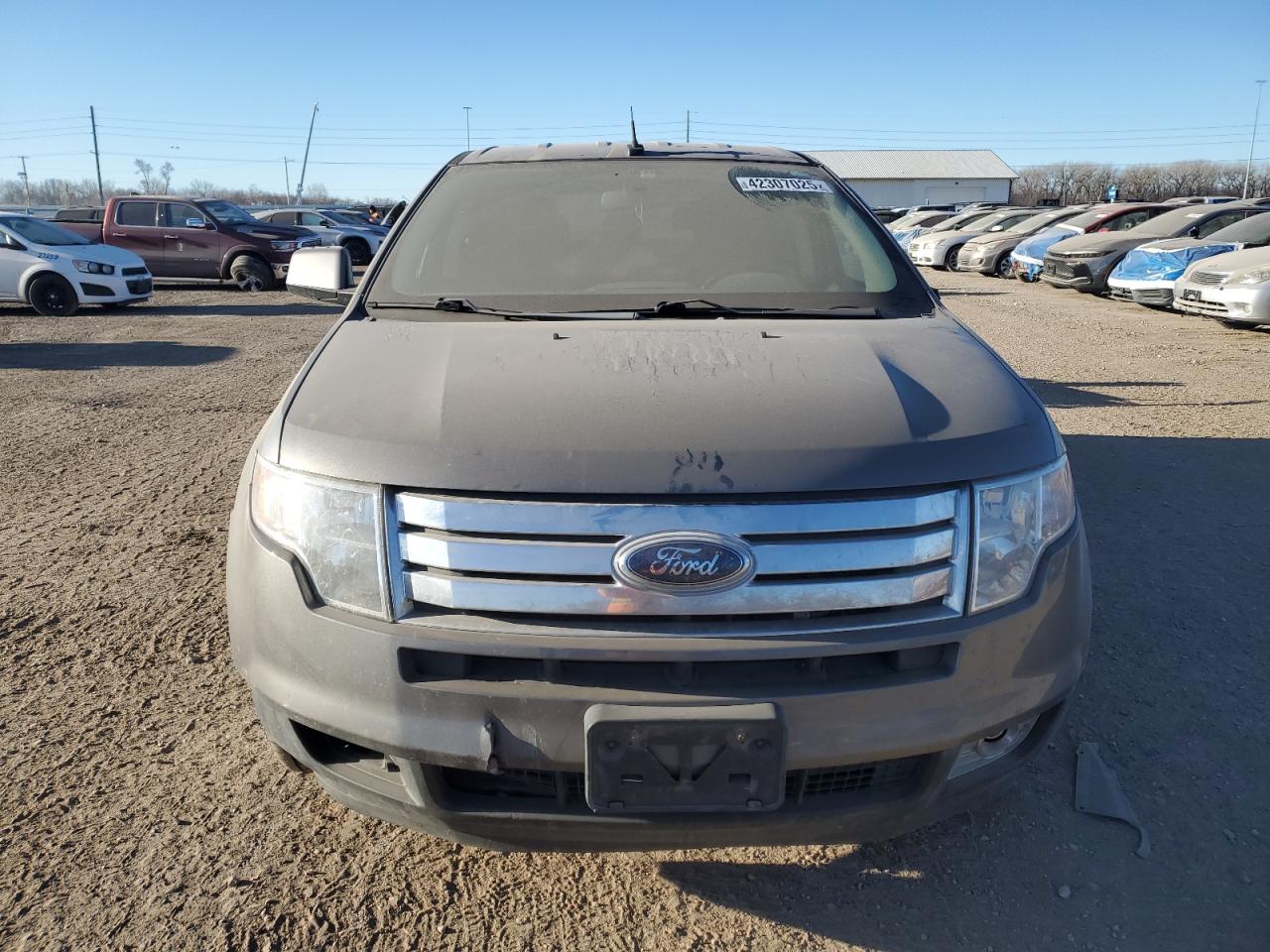 2009 Ford Edge VIN 2FMDK38C39BA35120 Copart auction photo, all over damage thumbnail 5