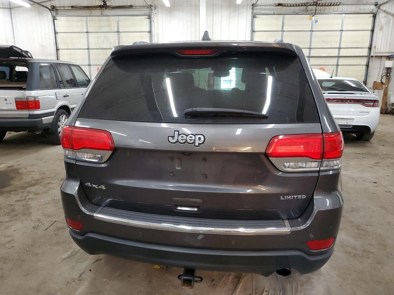 2018 Jeep Grand Cherokee VIN 1C4RJFBGXJC245468 Copart auction photo, side / front end damage thumbnail 6