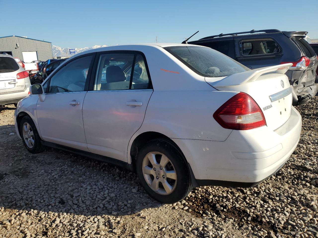 2007 Nissan Versa VIN 3N1BC11E57L414097 Copart auction photo, side / front end damage thumbnail 2