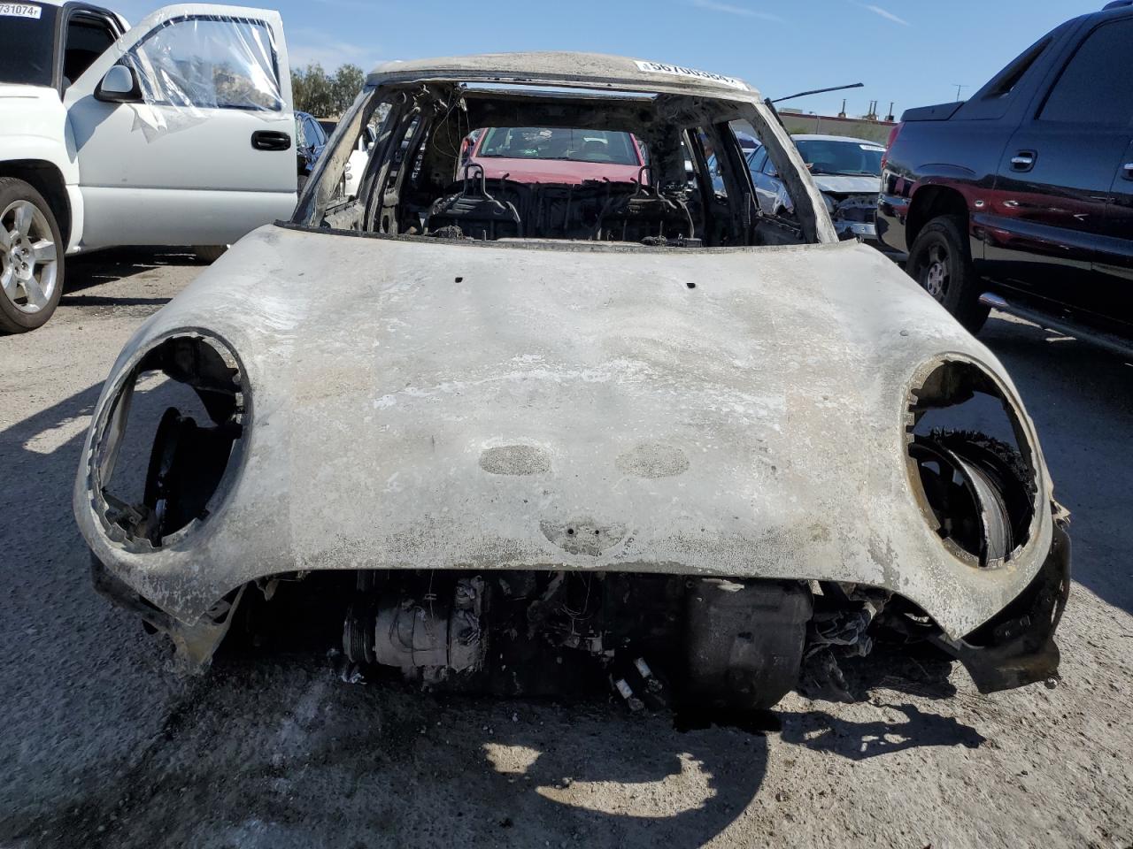 2015 MINI Cooper VIN WMWXS5C59FT828730 Copart auction photo, burn damage thumbnail 5