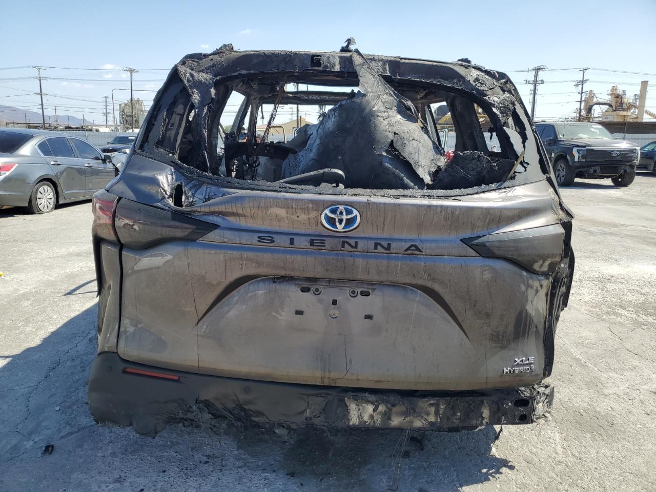 2021 Toyota Sienna VIN 5TDJRKEC5MS054566 Copart auction photo, burn damage thumbnail 6