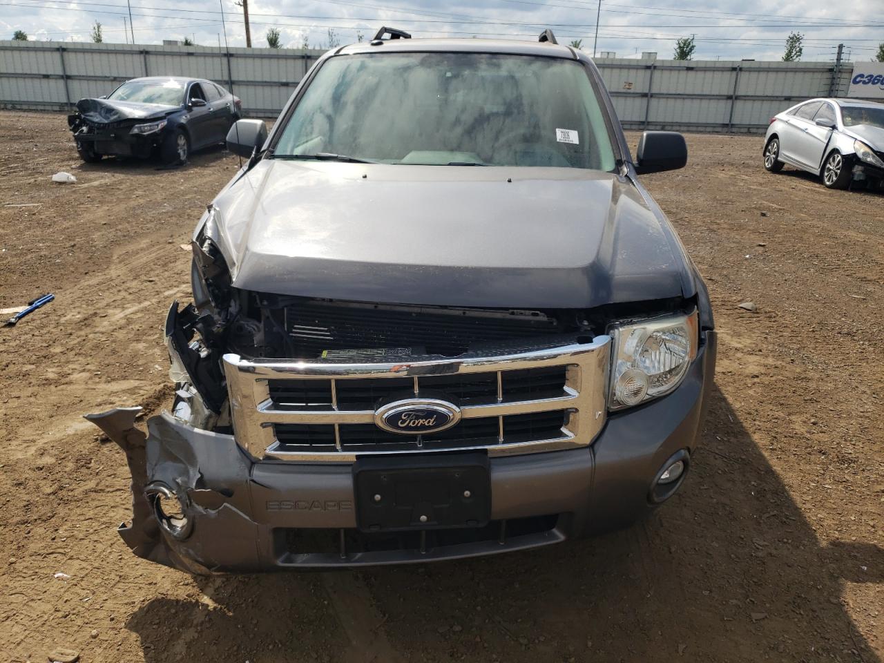 2009 Ford Escape VIN 1FMCU03709KC03669 Copart auction photo, front end damage thumbnail 5
