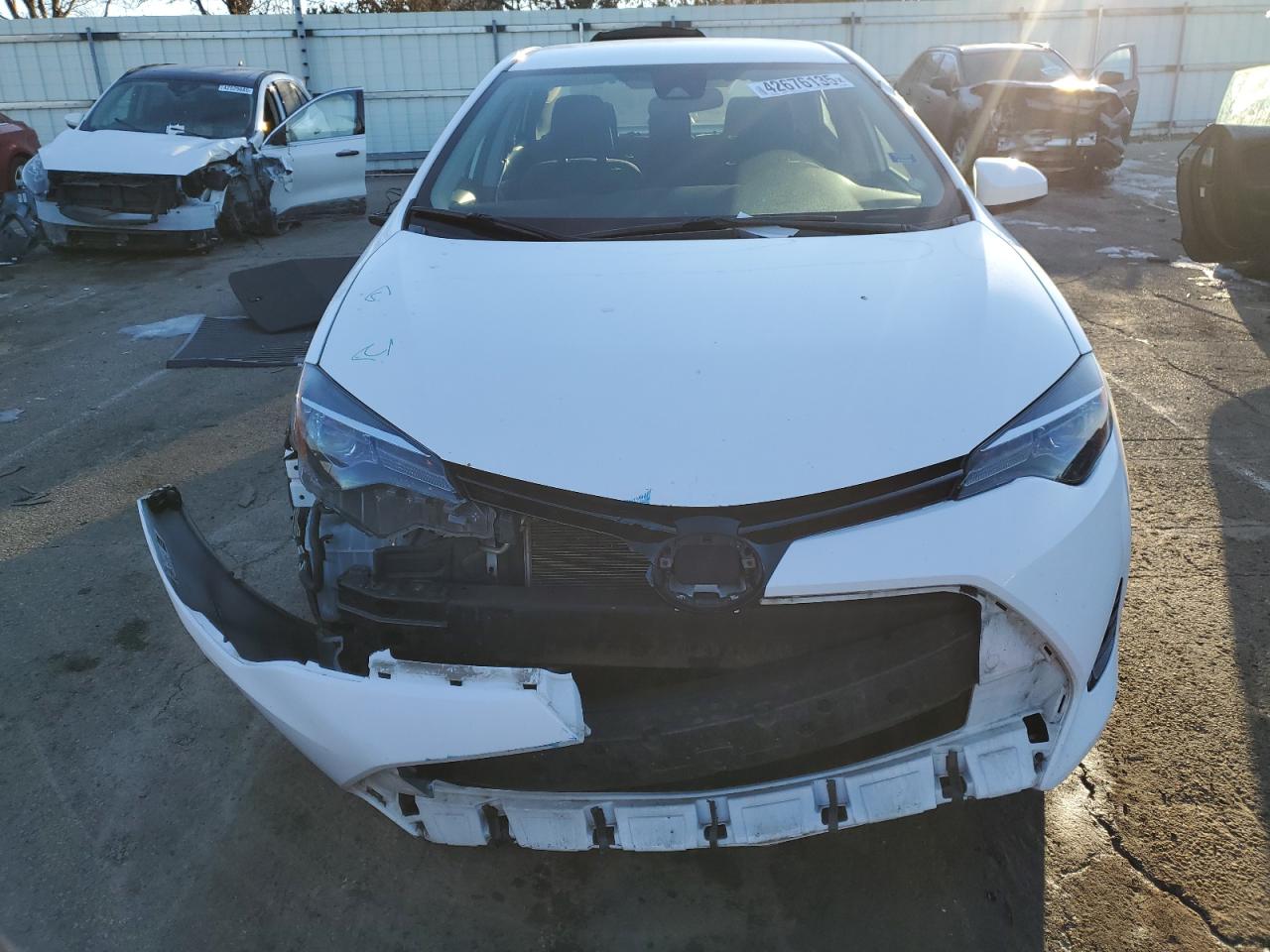 2017 Toyota Corolla VIN 2T1BURHE1HC883190 Copart auction photo, front end / side damage thumbnail 5