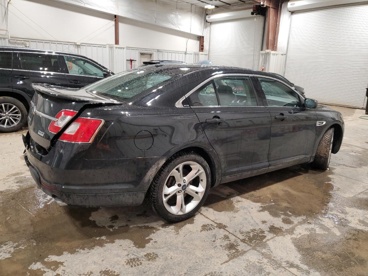 2011 Ford Taurus VIN 1FAHP2KT4BG114083 Copart auction photo, rear end damage thumbnail 3