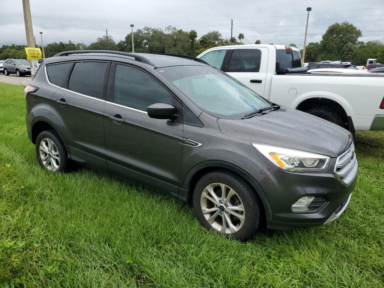 2017 Ford Escape VIN 1FMCU0GD4HUE65228 Copart auction photo, water/flood damage thumbnail 4