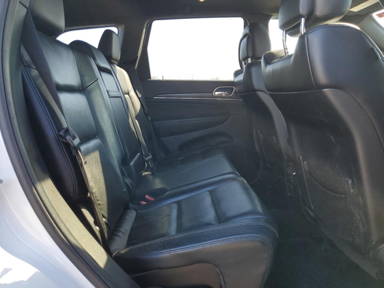 2017 Jeep Grand Cherokee VIN 1C4RJFBG0HC852621 Copart auction photo, side / rear end damage thumbnail 11