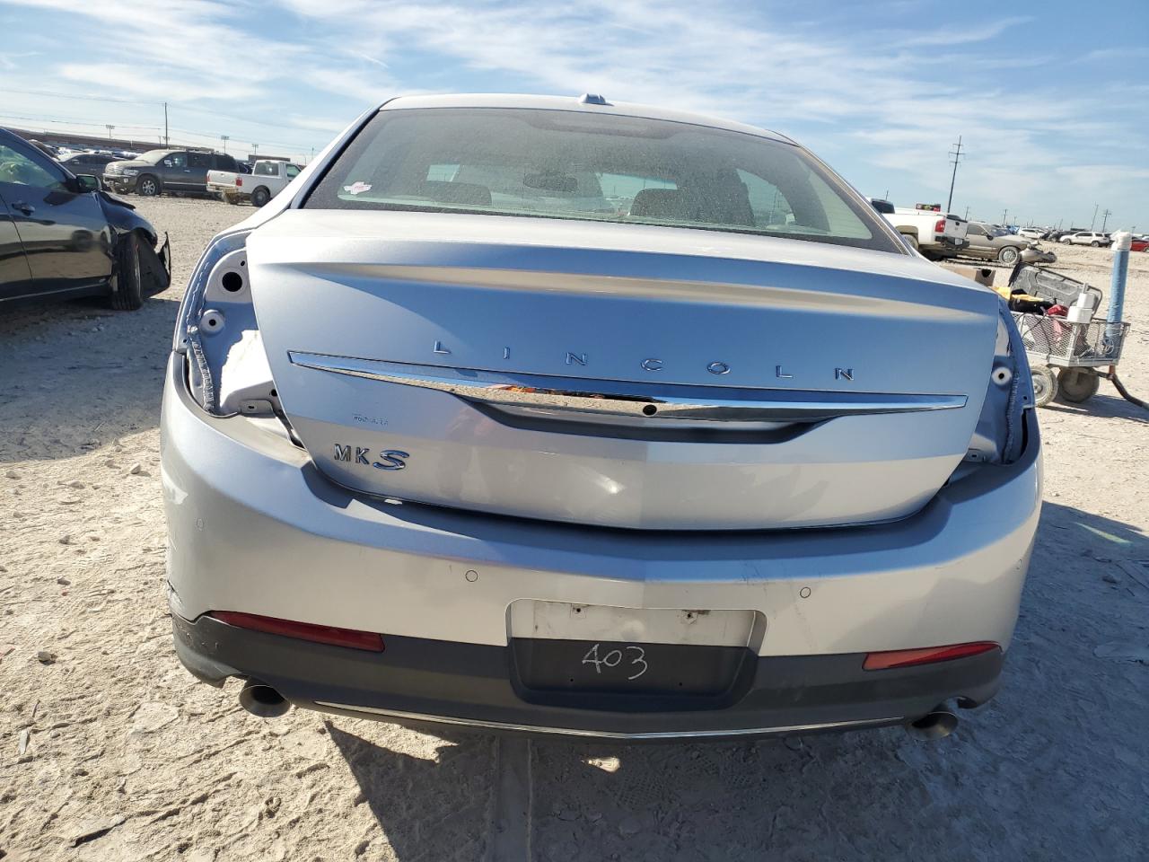 2016 Lincoln MKS VIN 1LNHL9DK2GG601403 Copart auction photo, rear end / minor dent/scratches damage thumbnail 6