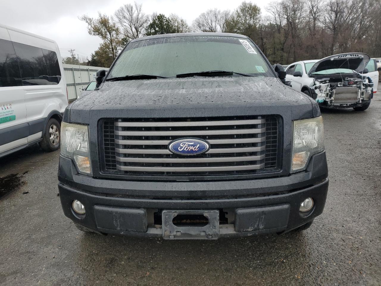 2010 Ford F-150 VIN 1FTEW1C87AKB37891 Copart auction photo, burn damage thumbnail 5