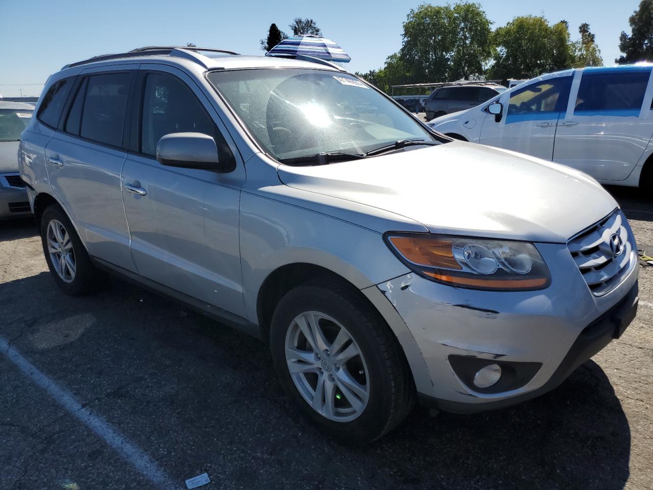 2010 Hyundai Santa Fe VIN 5NMSK4AG9AH385453 Copart auction photo, rear end / minor dent/scratches damage thumbnail 4