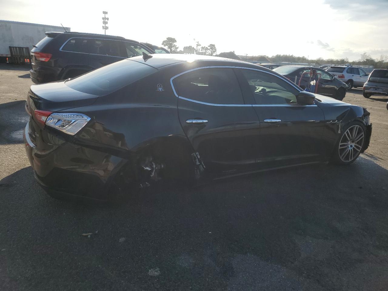 2015 Maserati Ghibli VIN ZAM57RTA6F1138196 Copart auction photo, rear end / front end damage thumbnail 3