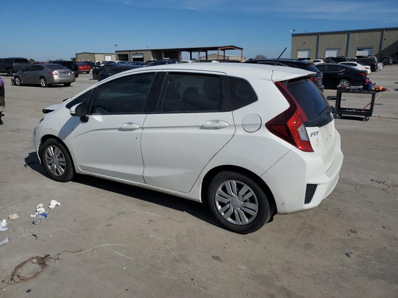 2016 Honda Fit VIN JHMGK5H58GX010748 Copart auction photo, all over damage thumbnail 2