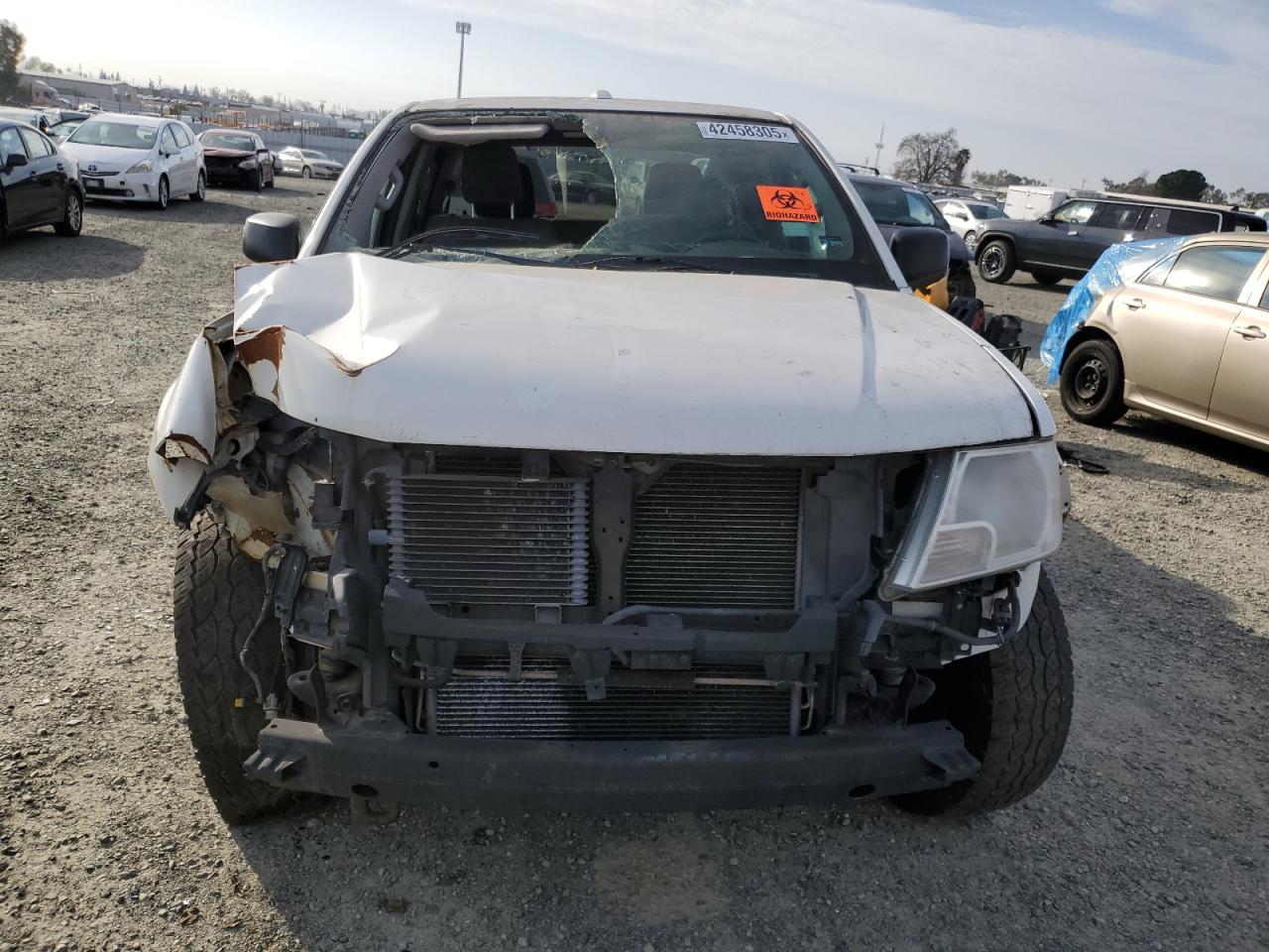 2013 Nissan Navara (Frontier) VIN 1N6AD0EV4DN725409 Copart auction photo, biohazard/chemical / front end damage thumbnail 5
