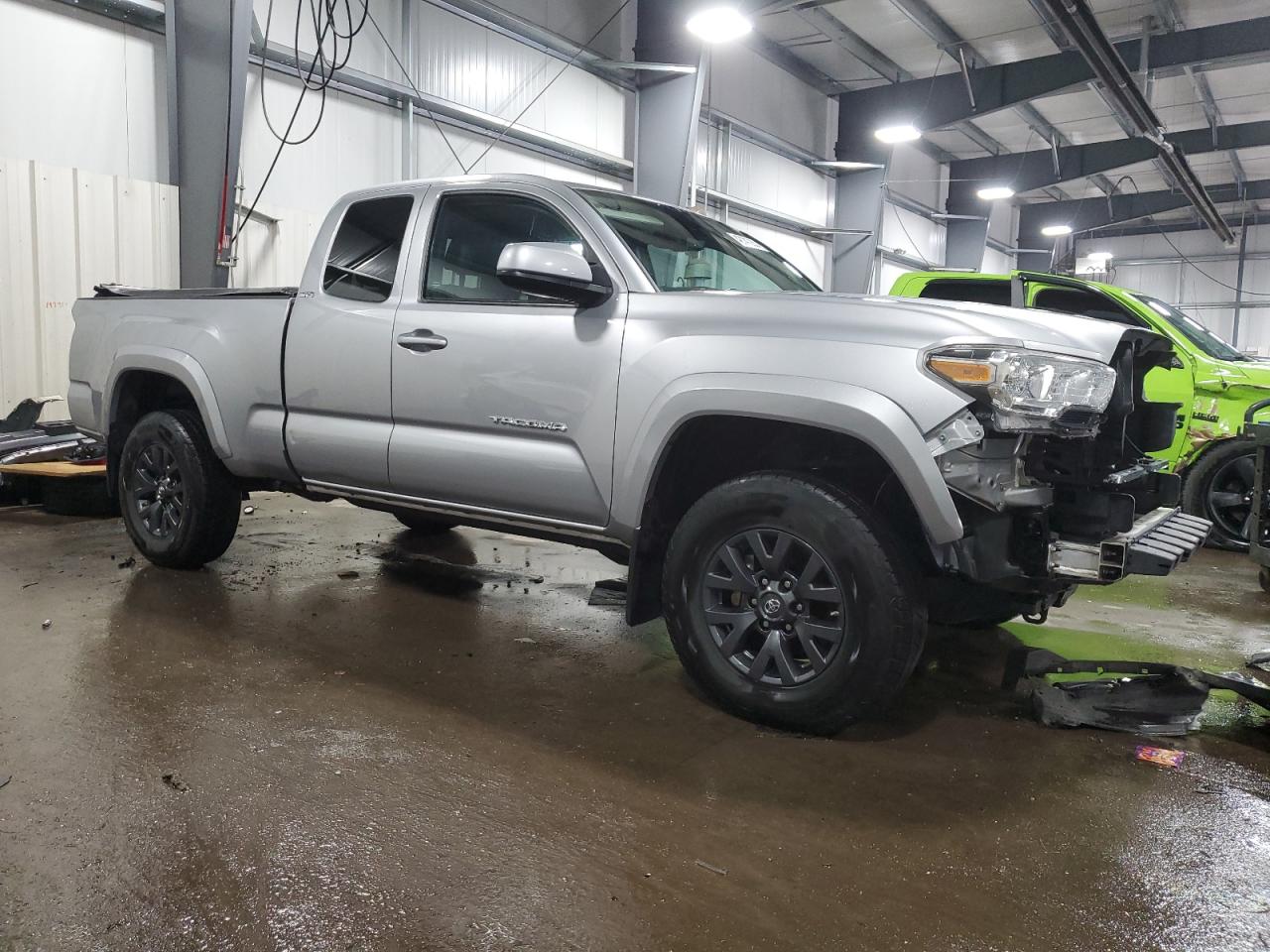 2020 Toyota Tacoma VIN 3TYSZ5AN6LT006090 Copart auction photo, front end / side damage thumbnail 4