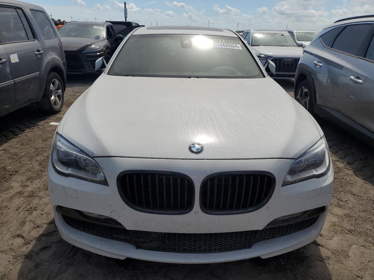2015 BMW 7er VIN WBAYF8C5XFD654560 Copart auction photo, water/flood damage thumbnail 5