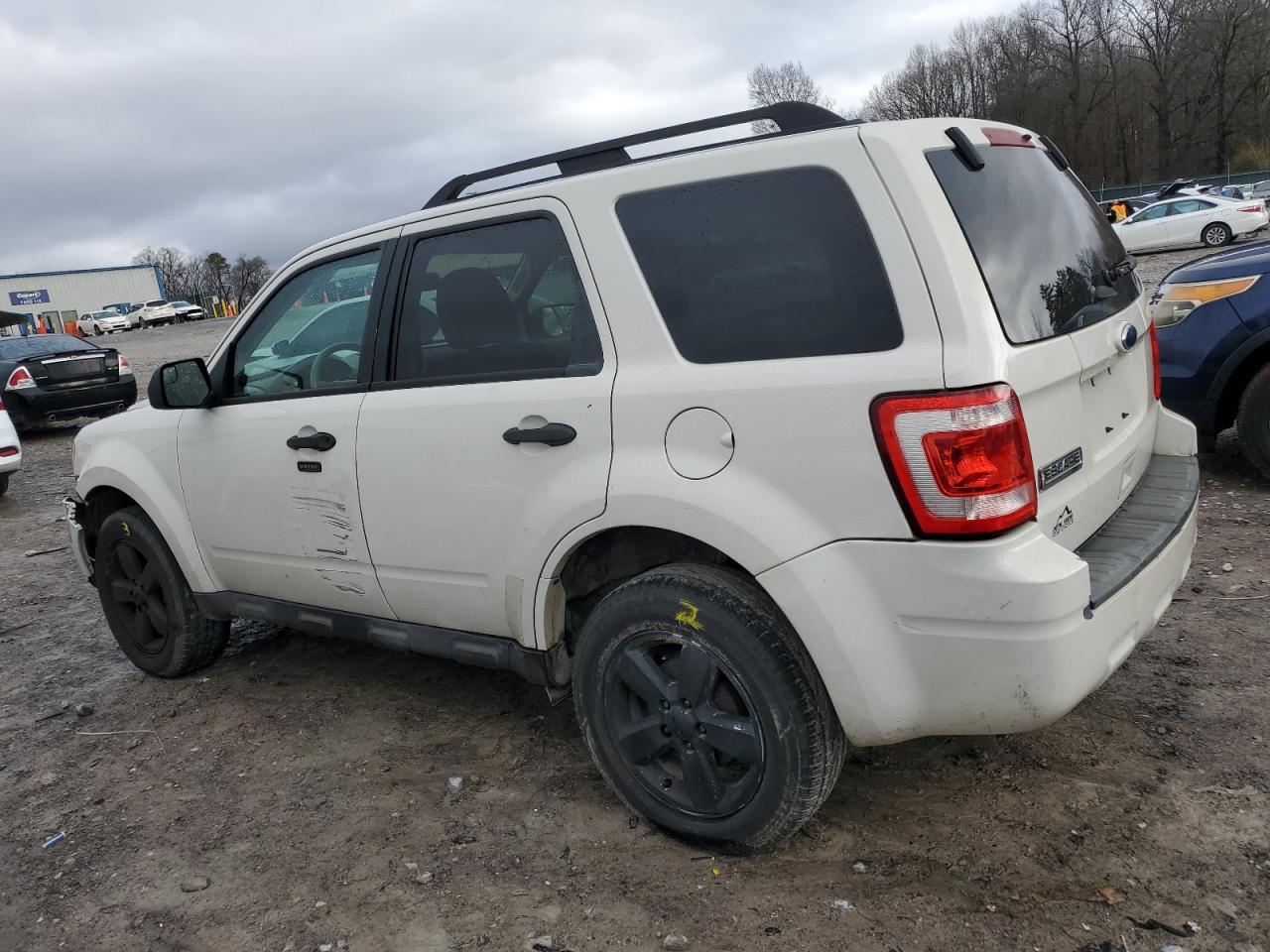 2011 Ford Escape VIN 1FMCU0D73BKB09547 Copart auction photo, front end / side damage thumbnail 2
