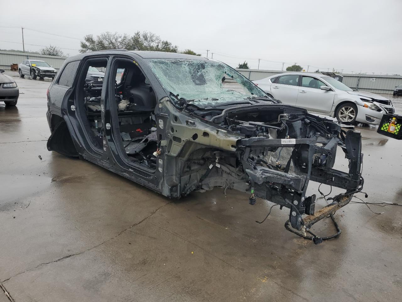 2016 Jeep Grand Cherokee VIN 1C4RJFDJ3GC324823 Copart auction photo, stripped damage thumbnail 4