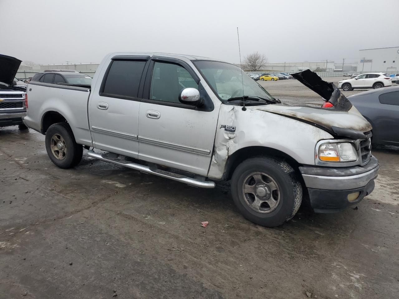 2002 Ford F-150 VIN 1FTRW07L82KD06604 Copart auction photo, burn damage thumbnail 4