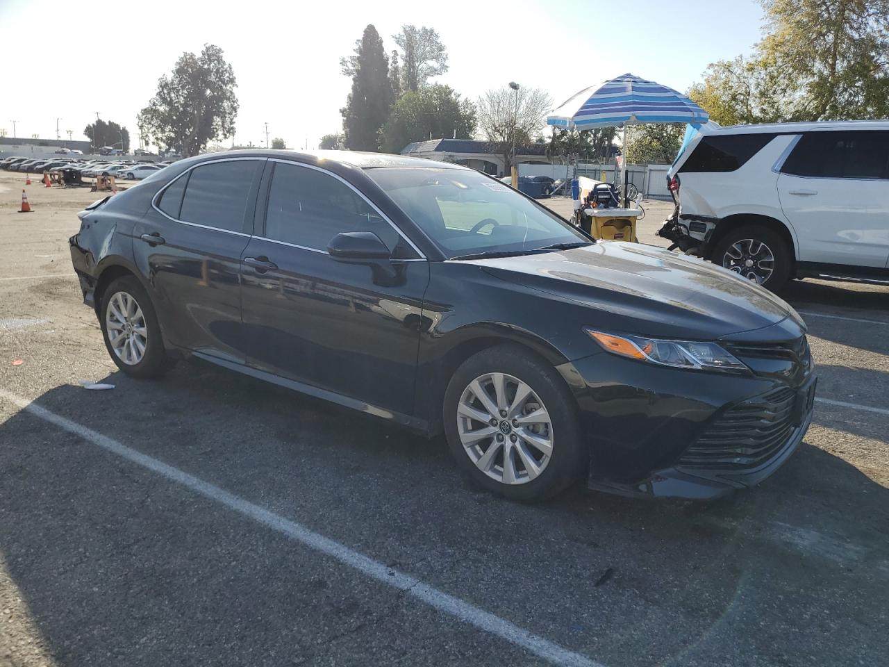 2019 Toyota Camry VIN 4T1B11HK0KU285355 Copart auction photo, rear end / minor dent/scratches damage thumbnail 4