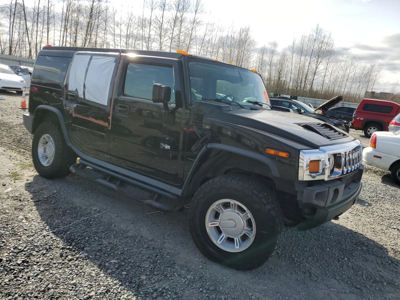 2005 Hummer H2 VIN 5GRGN23U35H119176 Copart auction photo, side damage thumbnail 4