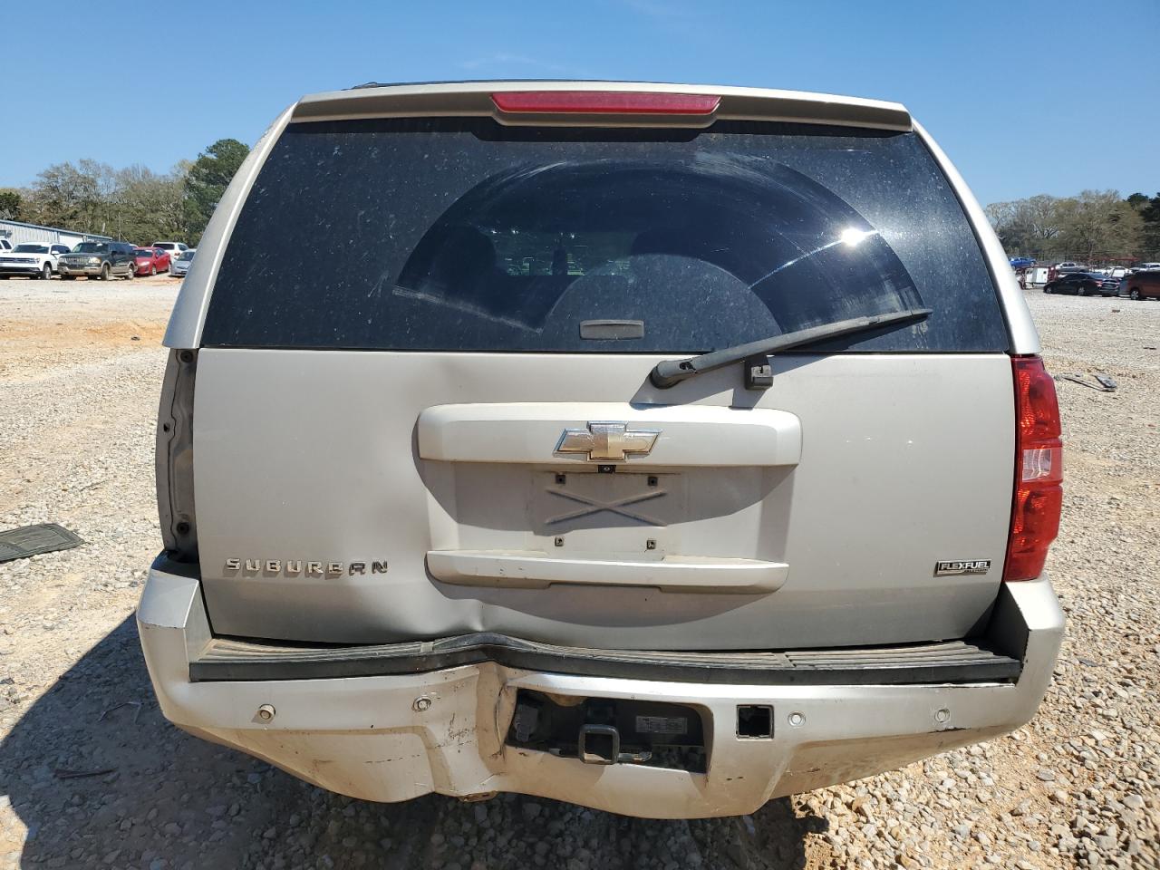 2009 Chevrolet Suburban VIN 1GNFC26029J105867 Copart auction photo, front end / rear end damage thumbnail 6