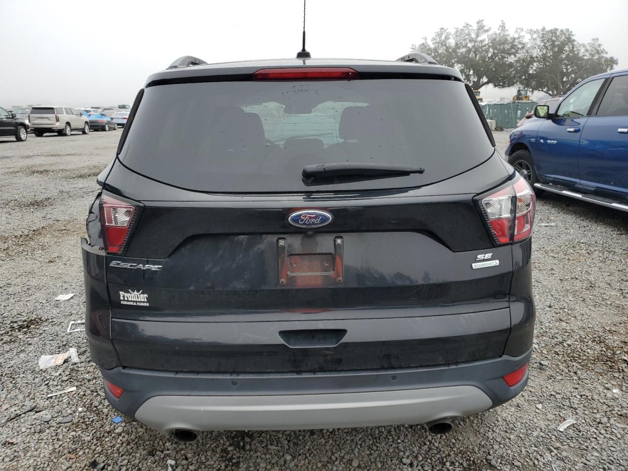 2017 Ford Escape VIN 1FMCU0GD0HUD85781 Copart auction photo, all over damage thumbnail 6