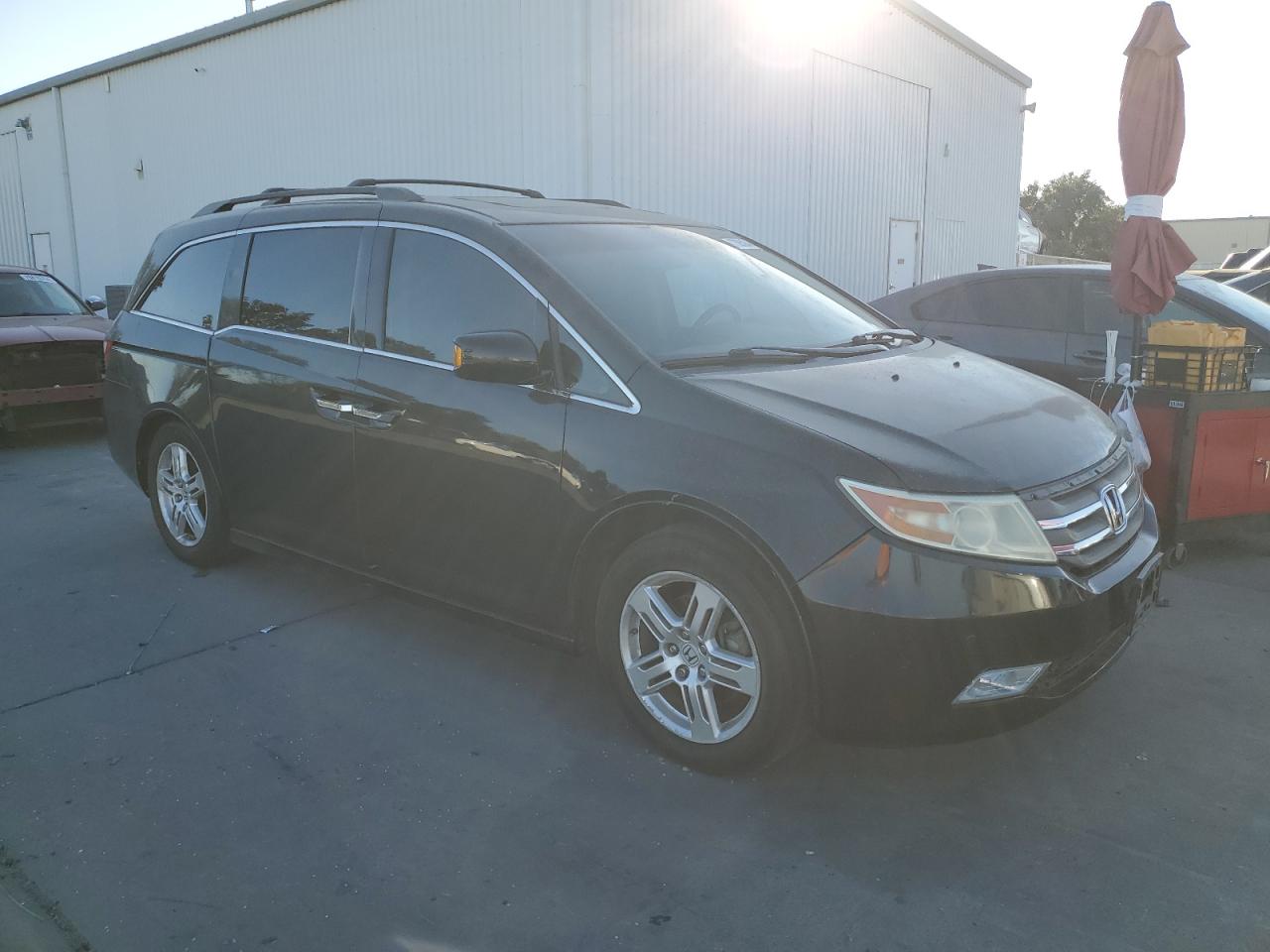 2012 Honda Odyssey VIN 5FNRL5H9XCB100210 Copart auction photo, minor dent/scratches damage thumbnail 4
