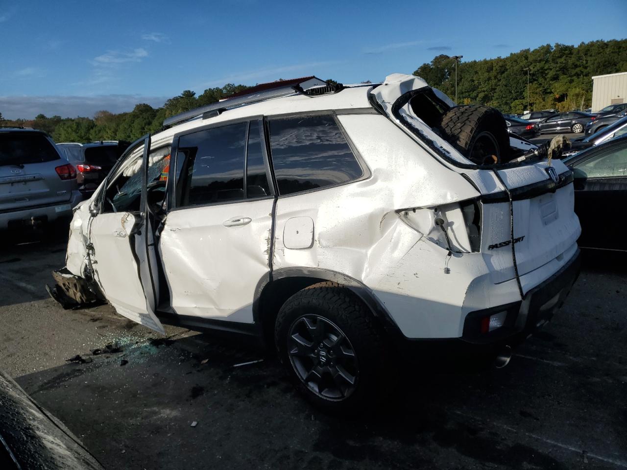 2024 Honda Passport VIN 5FNYF8H67RB008586 Copart auction photo, all over damage thumbnail 2
