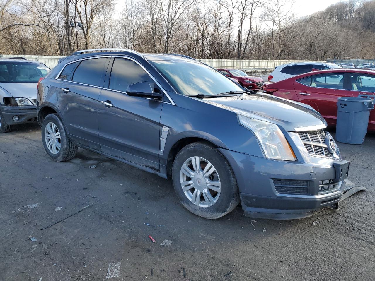 2012 Cadillac SRX VIN 3GYFNDE31CS576337 Copart auction photo, front end / side damage thumbnail 4