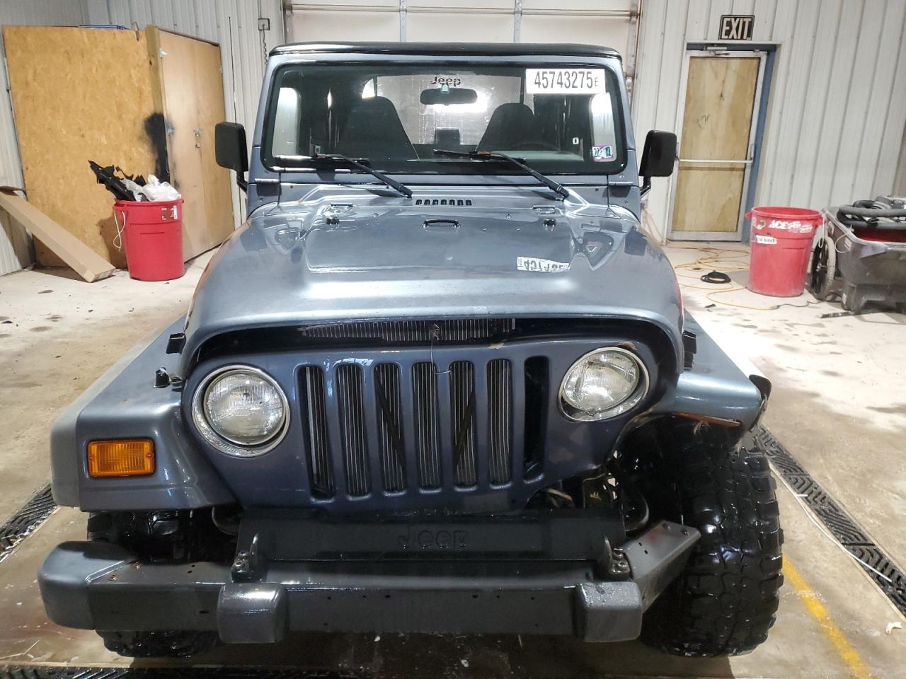 2001 Jeep Wrangler VIN 1J4FA29P31P357744 Copart auction photo, front end damage thumbnail 5