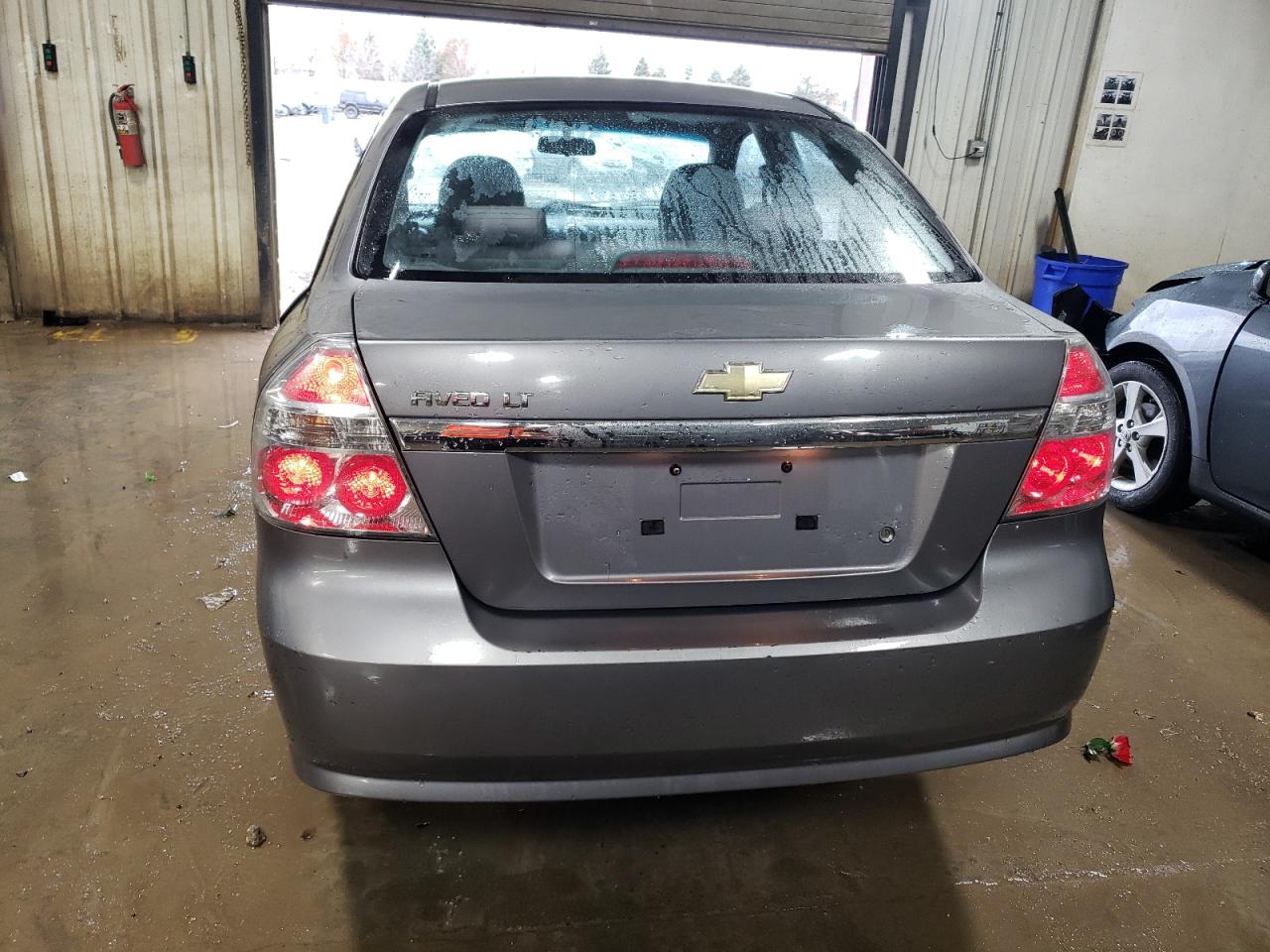 2009 Chevrolet Aveo VIN KL1TD56E59B371648 Copart auction photo, front end / side damage thumbnail 6