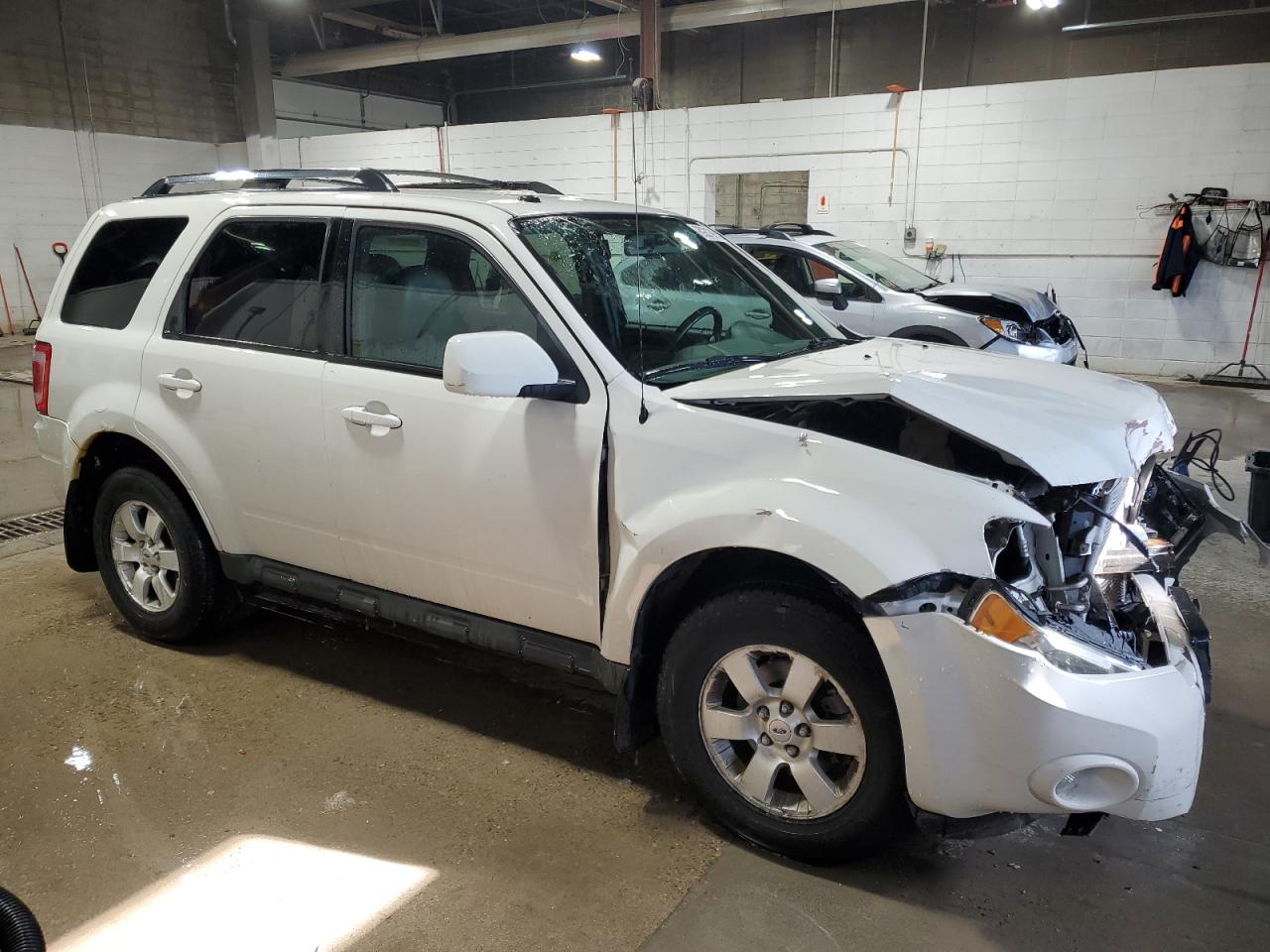 2010 Ford Escape VIN 1FMCU9E74AKA11399 Copart auction photo, front end / rear end damage thumbnail 4