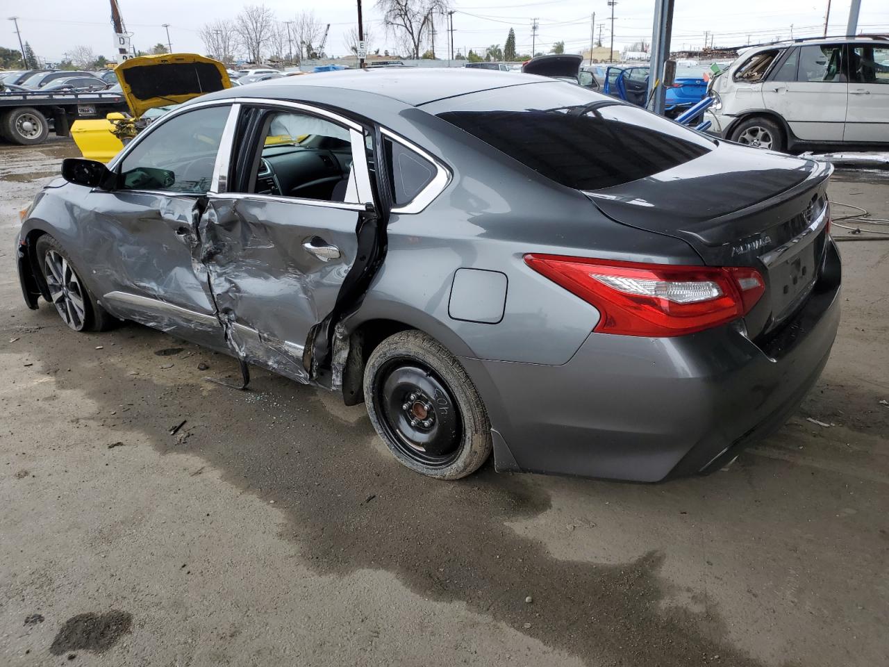 2016 Nissan Altima VIN 1N4AL3AP9GC147814 Copart auction photo, side / front end damage thumbnail 2