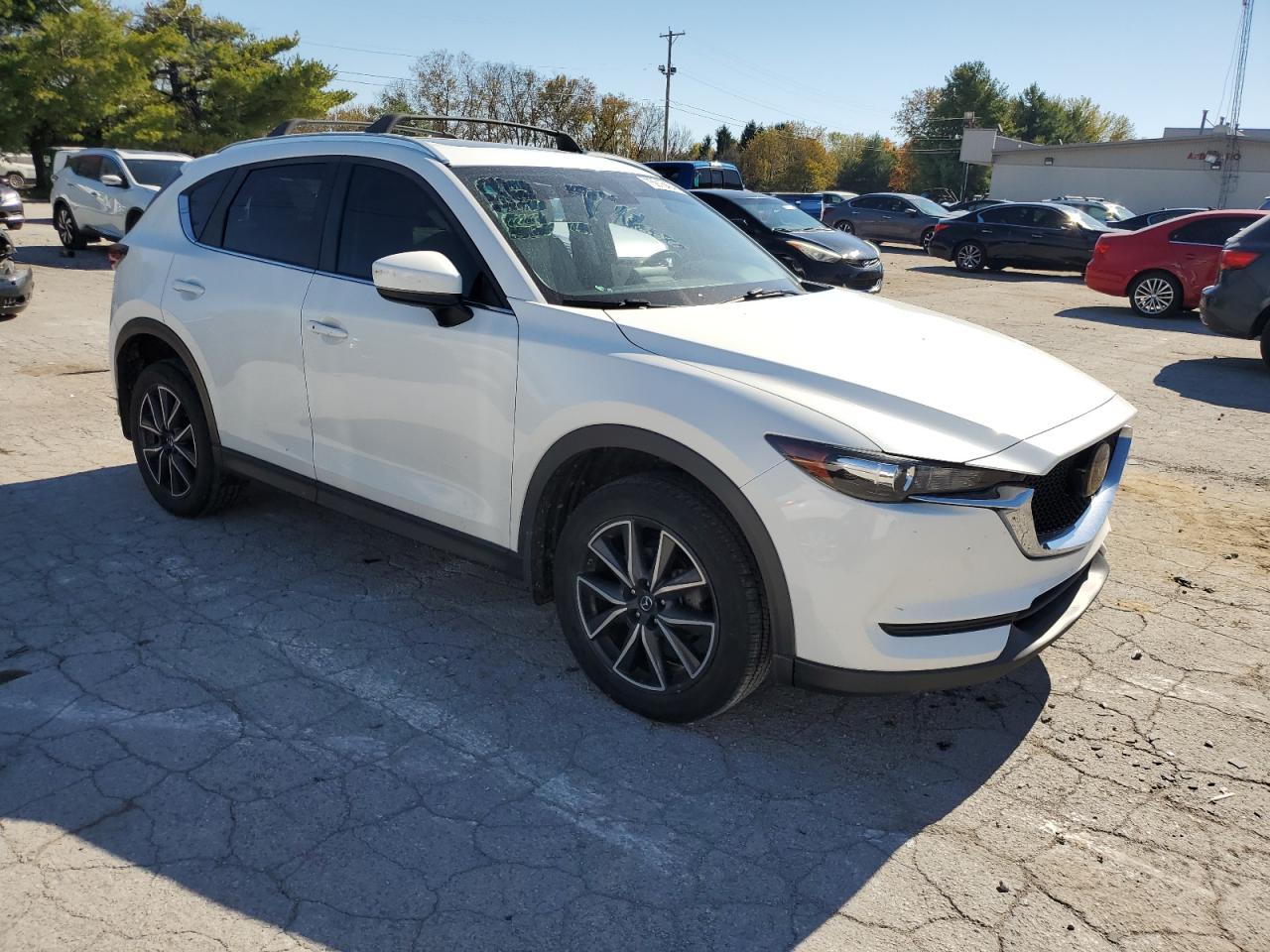 2018 Mazda CX-5 VIN JM3KFBCM3J0317572 Copart auction photo, side / rear end damage thumbnail 4